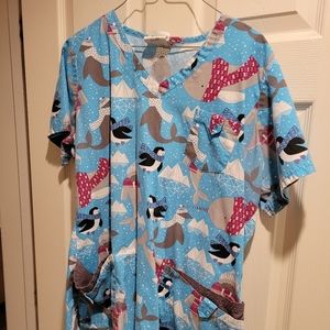 Turquoise snow animals scrub top